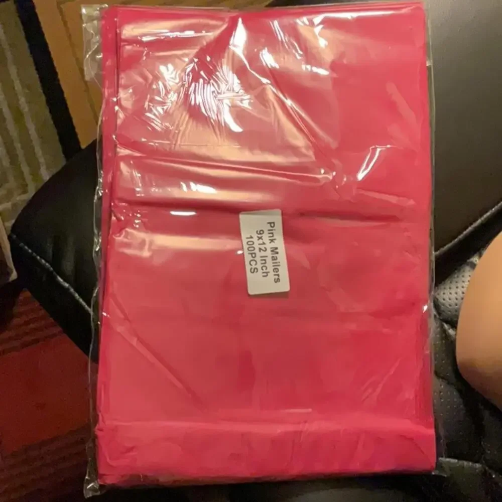 100 pink poly 9X12” shipping bags